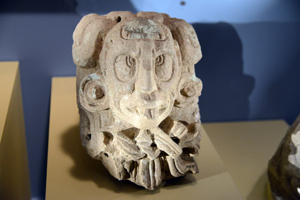 Stone head of the sun god or K'in, Maya (AD250-900), Copan, Honduras