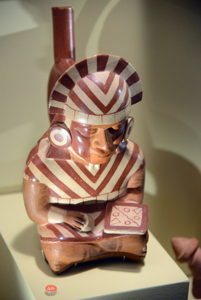 Ceramic vessel of seated warrior with shield, Moche (AD100-800), Ancash Region, Peru