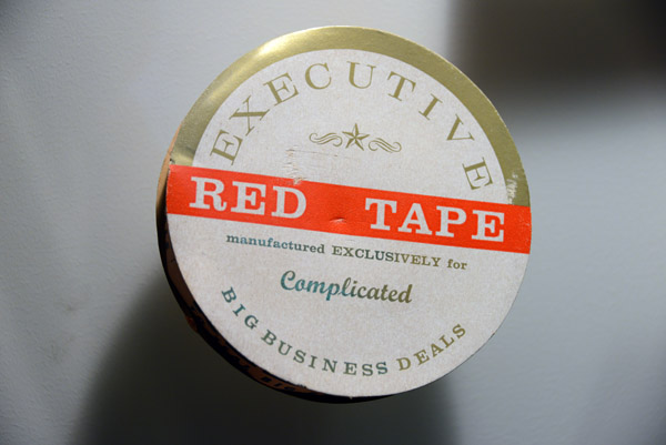 Executive Red Tape manufactured exclusively for Complicated Big Business Deals