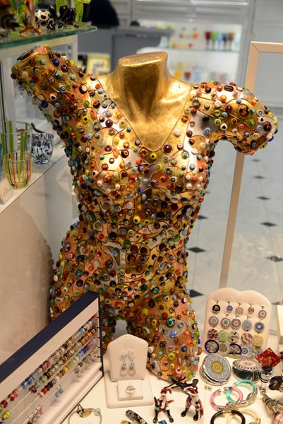 Female torso covered in Venetian glass beads