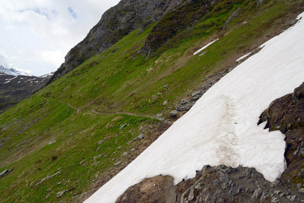 Snowfield blocking the track to Lake Toma, source of the Rhine
