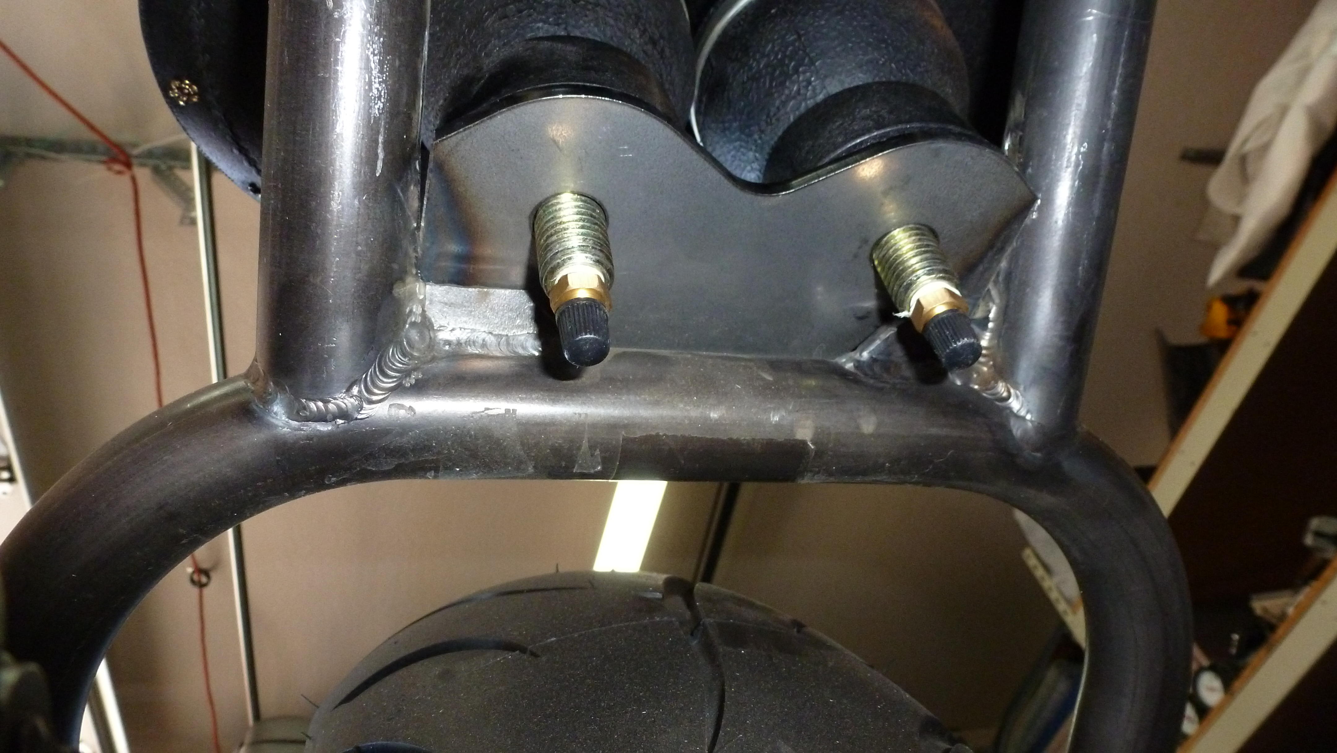 Will grind off more of the gussets so the air valve nuts will clear. 