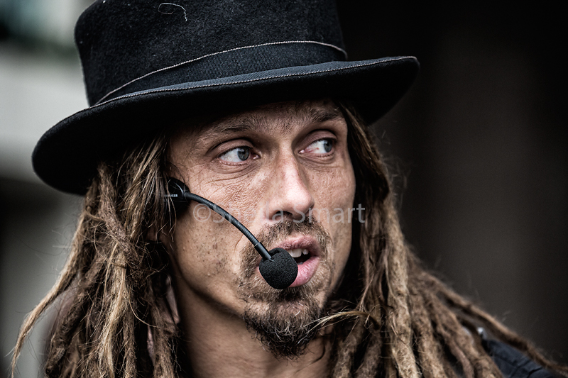 Dreadlocks busker close up