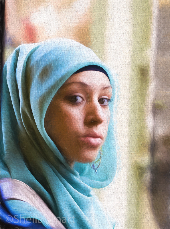 Young woman in blue hijab - Topaz filter