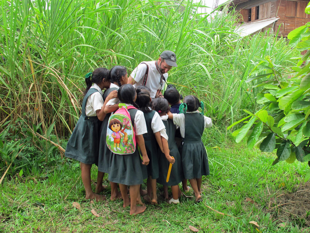 Tom showing the kids the picture he just took