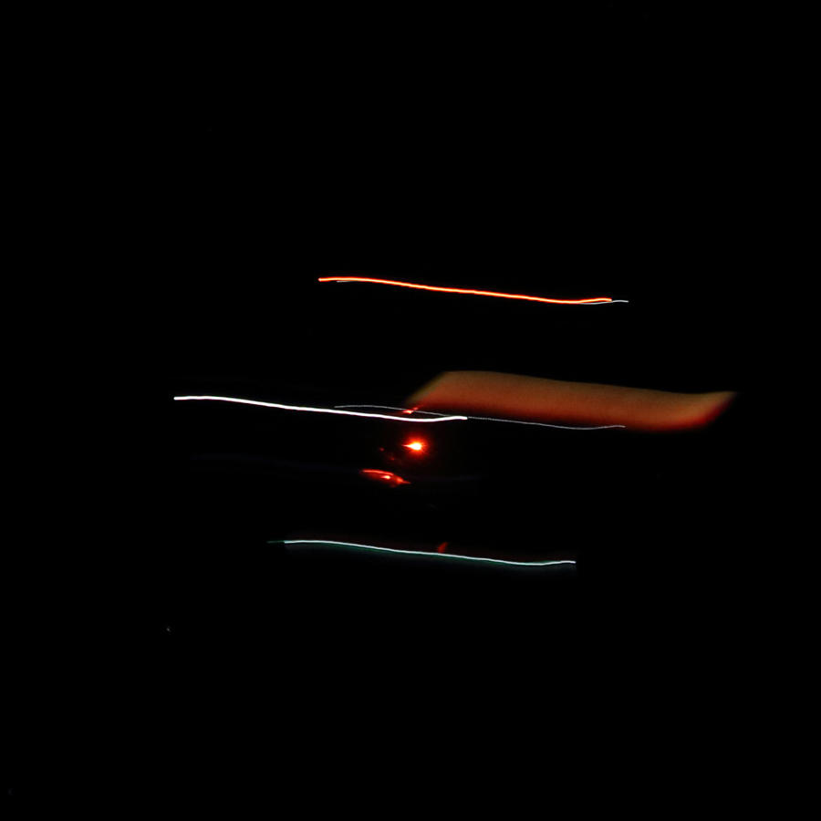 Jet flying across the night sky