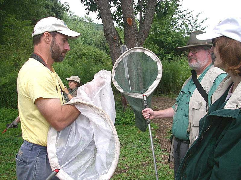 Tom shows Earle his catch