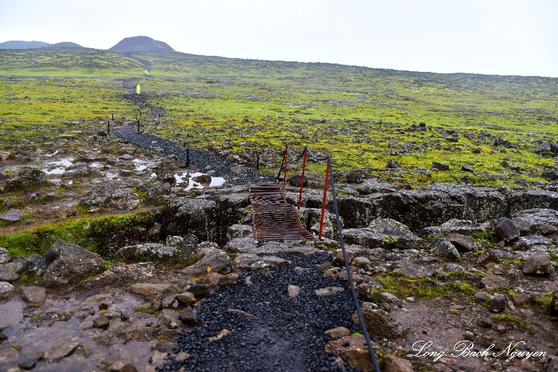 Crossing the fault line, Thirhnukagigur Volcano, Iceland  