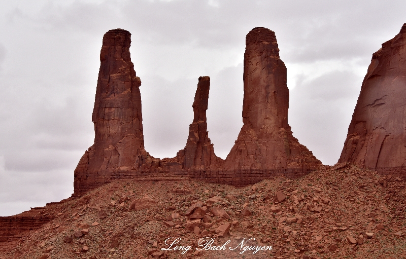 Three Sisters and Mitchell Mesa Monument Valley Navajo Tribal Park Arizona 725 