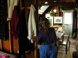 a view taken from Yolanda tiny harbor side bedroom looking out into her kitchen,