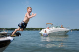 Ryan jumps off boat