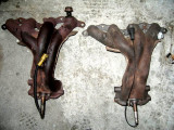 stock exhaust manifolds 85-86 on left (not my photo)