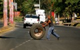 why did the tire cross the road?