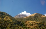 volcano between two mounds