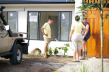 Marcia discusses the landscaping.