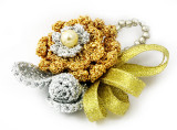 crocheted brooch