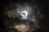 MALACCA, MALAYSIA - JANUARY 26: A partial solar eclipse as viewed from a reflection from a pool of water on January 26, 2009 in 