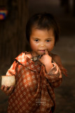 Young sister, Laos border town