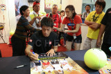 Kei Nishikori signing autographs