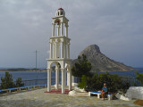Sherri and bell tower. Telendos behind. Kalymnos, Greece.