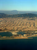 Barcelona from the air, with Montserrat poking through the haze