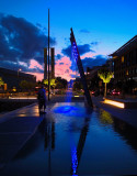 The Oslo Harbor. Coloured fountains and the nights sun over the North Pole