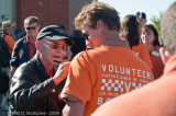 Stocky signs the shirt of a Vintage Wings volunteer.