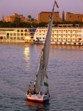 A felucca and Luxor Temple