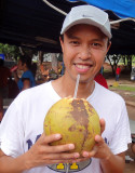Enjoying a Coconut