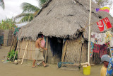 DSC01368 - Young Cuna man entering typical home