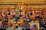 offerings to  bronze Buddha