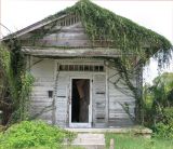 A Once Beautiful Shotgun-Style House