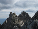A Distant Climber Descending From the Summit, Capitol Peak (14,130')