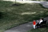 Orange Boy in Urban Park