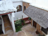 looking down into Amu House; our room is to the right under the thatched awning