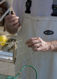 Another  Fisherman Repairing A Net
