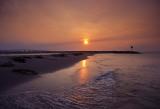 Setting Sun Over The Oregon Inlet