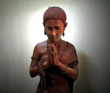 Teak sculpture of a Thai woman