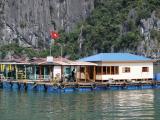 Floating houses with people