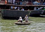 Tourist being rowed