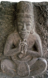 Figure with beads