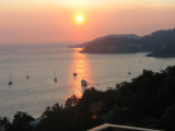 Sunset over Zihuatanejo Bay - view from condo balcony