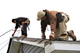 Desmond Linklater and David Etherington working on a roofing job in Moosonee