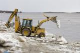 Clearing away ice at public dock site