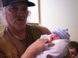 My father, Peter Searching Owl Giove, communes with his grandson.