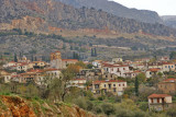 Delphi in the lap of Mount Parnassus overlooking the Amfissa valley.