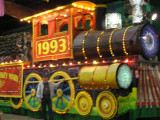shows size of float with Rolf standing by wheel