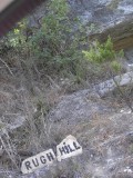 Rugh Hill Road sign - and they aint just a woofin!