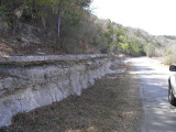 Eroded sandstone next to the river& road