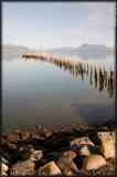 In Puerto Natales, an abandoned dock with Sarmiento Mountains and the Southern Ice Field as backdrop